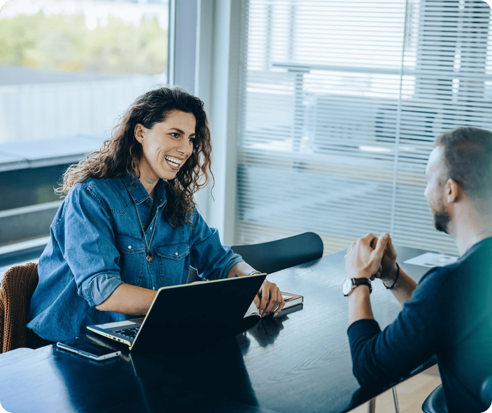 woman working digital device network graphic overlay min